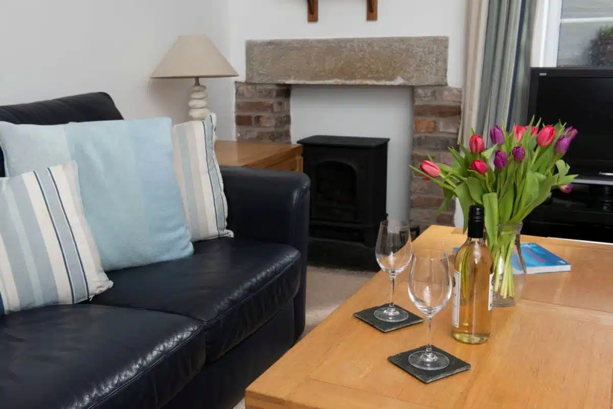 Hidden Cottage living room with log burner