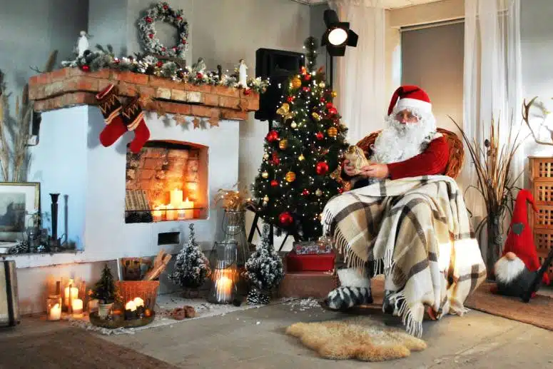 Father christmas in a festive cottage