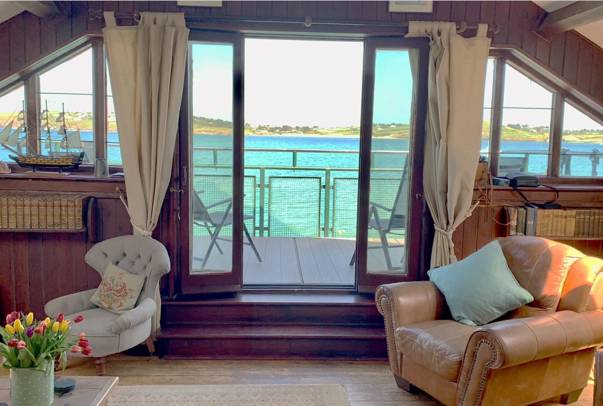 Living space and sea view balcony at The Old Lifeboat Station