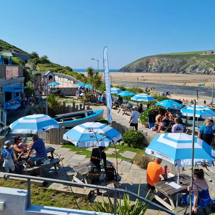 Pub garden and beach view at The Merrymoor